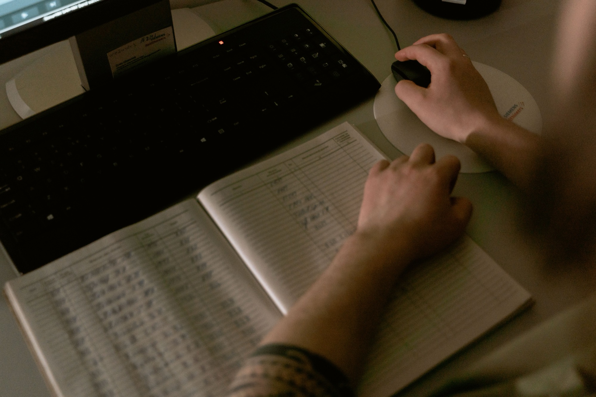 Medical coding specialist reviewing hospital coding work